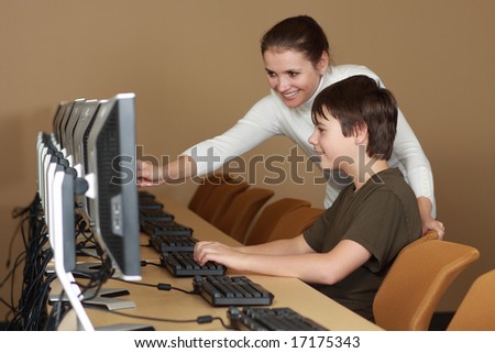 Teacher and student in computer lab