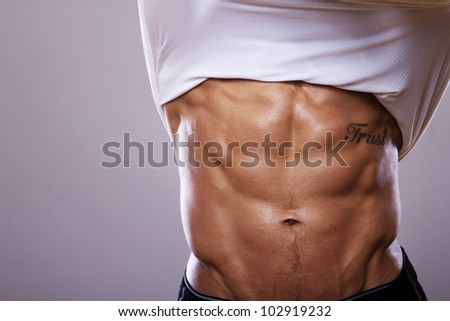 Close image of muscle man torso