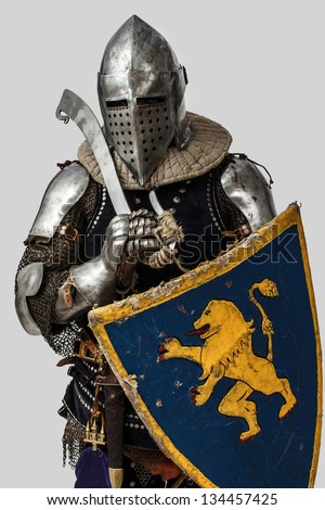 Image of knight with weapon and shield