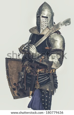 Image of knight with sword on his shoulder