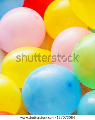 Yellow, pink, green, red and blue balloons