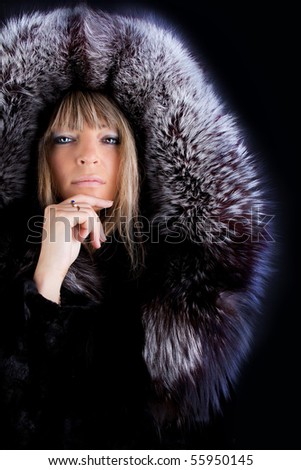 Image of glamorous woman wearing a fur coat
