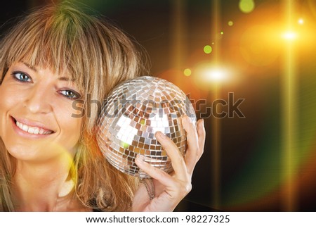 Sexy female  holding a sphere