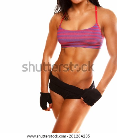 Fitness woman in sportswear with long black hair. Isolated on white background