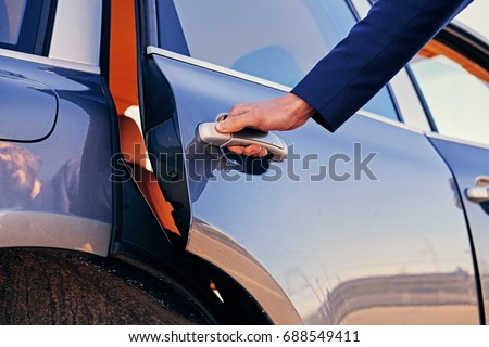 Close up image of a man opens car's door. ストックフォト © 
