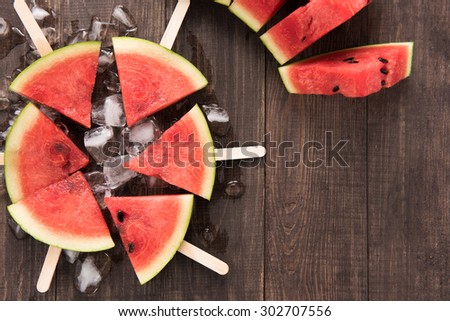 Fruit ice cream sliced watermelon on wooden background.