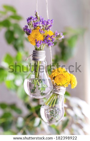 Creative wedding decoration - flowers in a light bulb