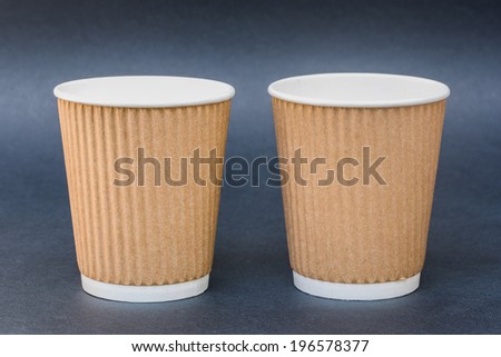 Pure kraft ripple wrap paper coffee cup template mockup isolated on black / gray background ready for hipster logo print or branding identity