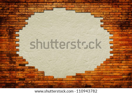 Grungy paper background surrounded by brick frame isolated