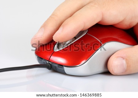 Computer mouse and men\'s hand