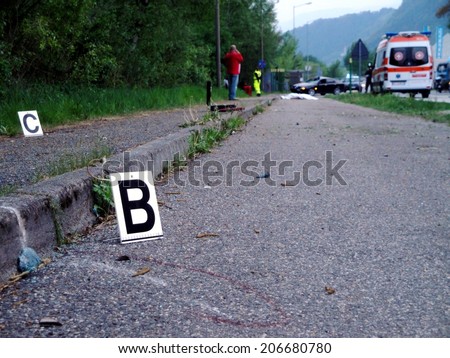 BOLZANO - April 30, 2010: Scene of fatal pedestrian car crash accident with collision on the street. Deadly road accident with victim and intervention of Paramedics in Bolzano on April 30, 2010
