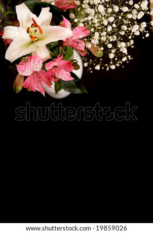 Bouquet from lilies of white and pink color on a black background.