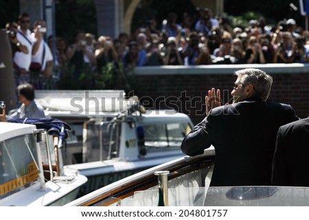 VENICE, ITALY - SEPTEMBER 08:  George Clooney arrives by boat at the 66th Venice Film Festival on September 8, 2009 in Venice, Italy.