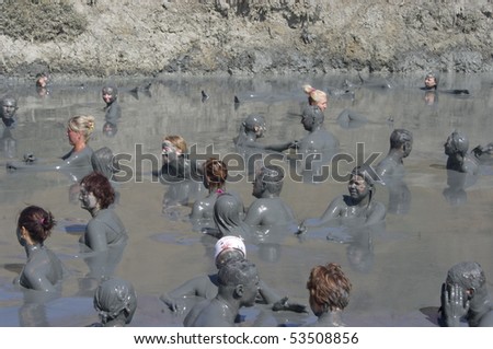 THOMANN - AUGUST 20: Feast of the gifts of nature, people take curative mud in the mud volcano. Event August 20, 2009 in Thomann, Russia.
