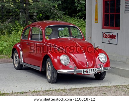OSLO, NORWAY - JULY 27: Red historical car (Volkswagen Beetle) in Oslo natural museum on July 27, 2011. Norwegian Museum of Cultural History shows history and life of Southern Norway.