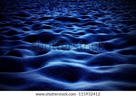 Dreamy winter landscape with strong dark blue shadows