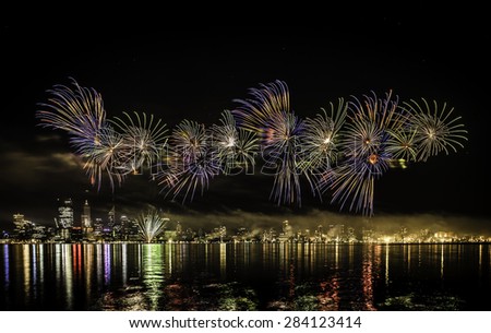 Fire works over Swan River in Perth, Western Australia, with the City in the background, celebrating Australia Day.