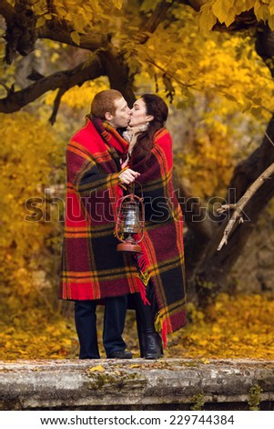 Happy young couple in love meeting on the autumn leaf . Autumn set. . love, relationship, family and people concept -