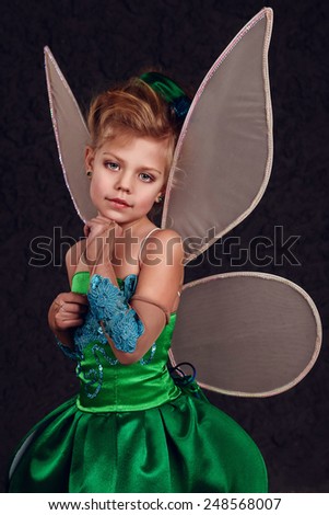 Tinker Bell.  little girl dressed as a fairy tale of Peter Pan