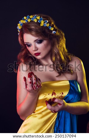 Portrait of Ukrainian woman , Praying woman, Pray for Ukraine, war. Ukrainian symbols and colors