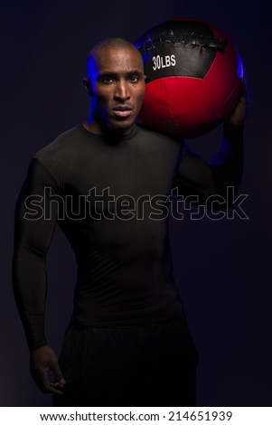 Portraits of a physical fitness trainer, while in the studio, using coloured gels, to create an edgy look.