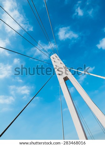 Rope bridge and cable sling of bridge. Rope bridge with blue sky. Architecture abstract with rope bridge.