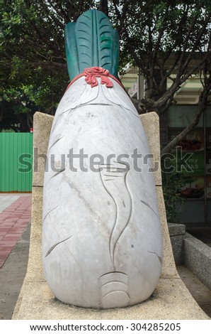 New Taipei City/Taiwan - 16 October 2011: A radish carved out of white jade. Pronunciation of radish is close to \