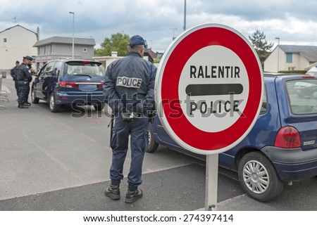 DEAUVILLE, FRANCE - MAY 5, 2014 : French police control cars because of plan Vigipirate, plan against attack terrorist