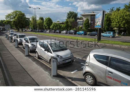 LE CHESNAY, FRANCE - MAI 25, 2015: Cars Autolib parked for rental next to Paris. Autolib is a french carsharing service of electric car.