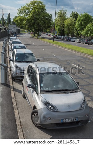 LE CHESNAY, FRANCE - MAI 25, 2015: Cars Autolib parked for rental next to Paris. Autolib is a french carsharing service of electric car.
