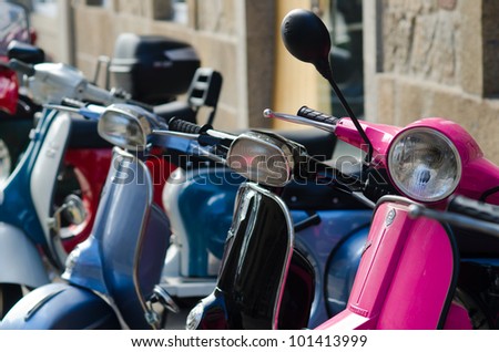 CUNTIS - FEBRUARY 26: Details of motorcycles Vespa and Lambreta type in the concentration of old bikes held on 26 February, 2012, in the village of Cuntis, in the province of Pontevedra, Spain.