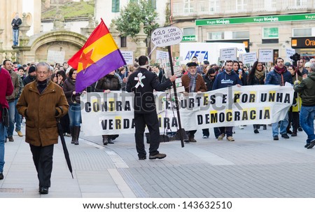 PONTEVEDRA - FEBRUARY 23: Detail of one of the demonstrations, protesting against social cuts approved by the Conservative government on February 23, 2013 in Pontevedra, Spain.