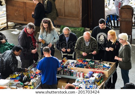 BARCELONA, SPAIN - APRIL 11, 2014: One of the stall selling used items and antiques at the famous market Encants Vells in the city of Barcelona.