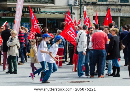 PONTEVEDRA, SPAIN - MAY 1, 2014: Detail of the participants, including major labor unions, in the demonstration for the celebration of Labor Day.
