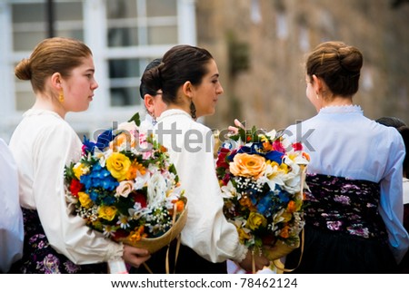 PONTEVEDRA, SPAIN - MAY 1: Folk dance group from Galicia are prepared to dance during the celebration of the May Festival in Pontevedra, May 1, 2011, Pontevedra, Spain.
