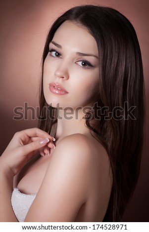 Beauty Woman face with ideal skin and brunette hair, spa, cosmetology, perfect skin woman, natural makeup girl, beauty model portrait. Brown hair woman. Brunette long hair. studio, isolated.