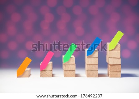 Wood graph with pink background and colorful sticker