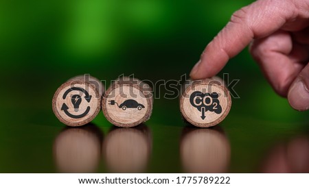 Concept of carbon reduction on wooden logs