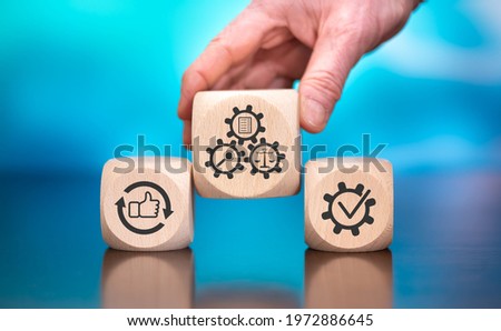 Wooden blocks with symbol of assessment concept on blue background Stok fotoğraf © 