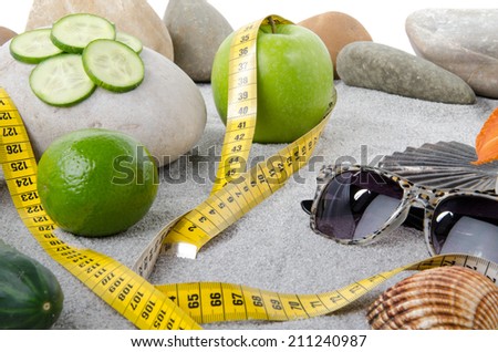 Composition to show the concept of healthy nutrition, weight loss and beach