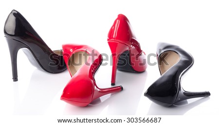 Black and red high heel shoe, isolated on white