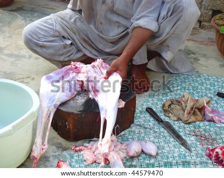Butcher Making Meat in an unhygienic place