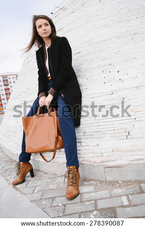 Woman street style. Demi-season concept
