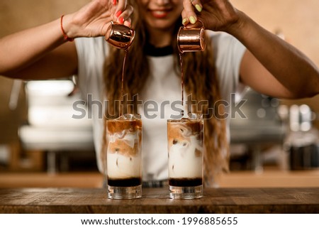 Similar – Image, Stock Photo Preparation of a cold mixed coffee on ice