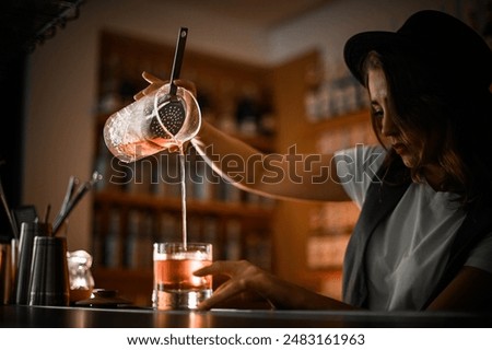 Similar – Image, Stock Photo Woman pouring cocktail in metal mug