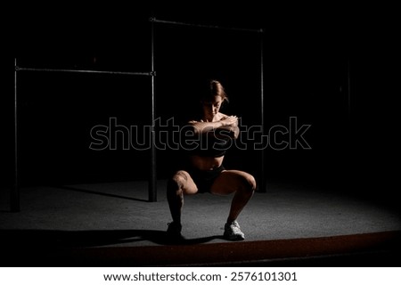 Similar – Image, Stock Photo Female athlete doing pull up exercises