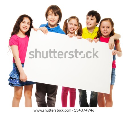 Happy smiling group of kids, friends, boys and girls, showing blank placard board to write it on your own text isolated on white background