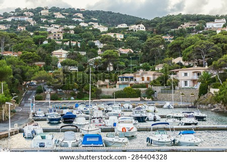 Saint - Tropez, FRANCE - NOVEMBER 3, 2014: A typical small harbor for personal water transport in a quiet place.