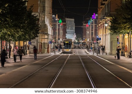 NICE, FRANCE - NOVEMBER 2, 2014: Modern tram in the center of city. Tram is the main mode of transport in the city. The tram line connects the western and eastern parts of the city.