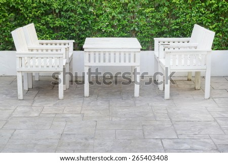 old white wooden  table set decorate in garden restaurant